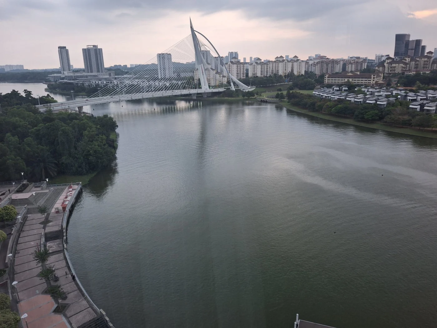 Urban water body bordered by buildings and vegetation