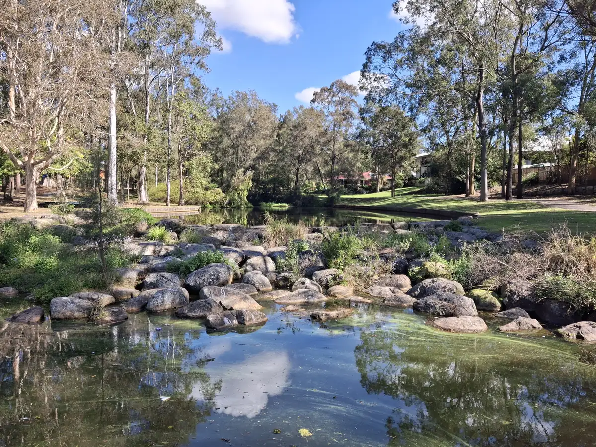 A managed pond where aquatic vegetation is treated